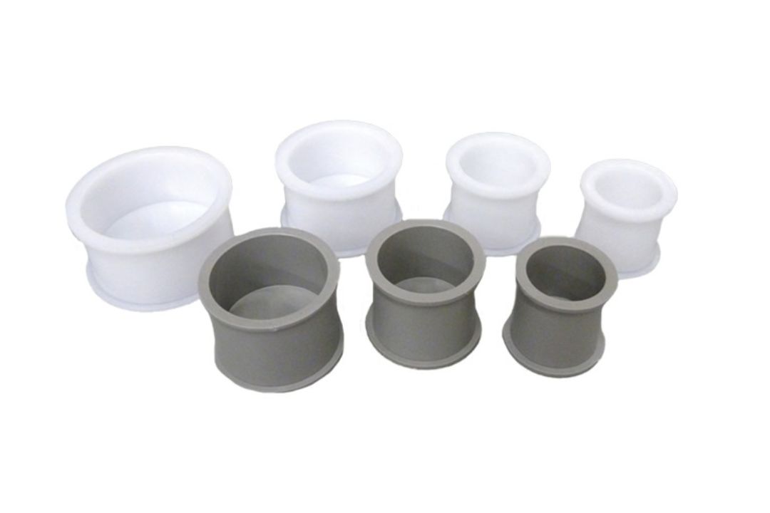 picture of mounting accessories, more specifically mounting cups